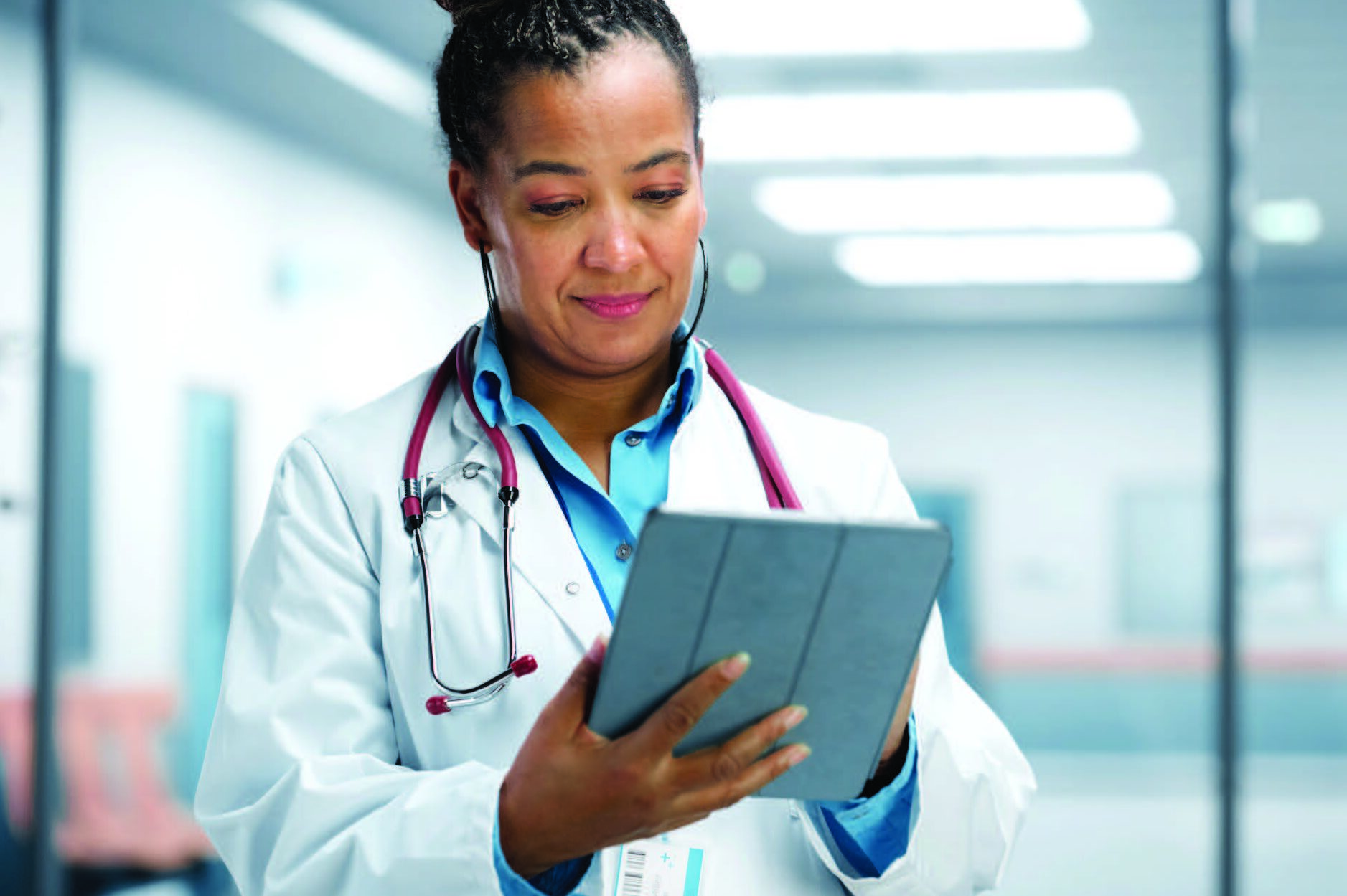 Doctor looking at a tablet