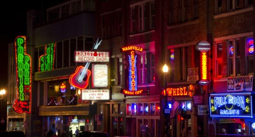 Neon signs lit up at night in Nashville, Tennessee